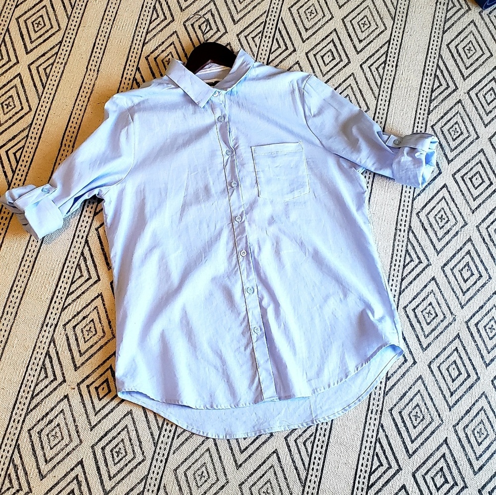 Woman's dress button down shirt.